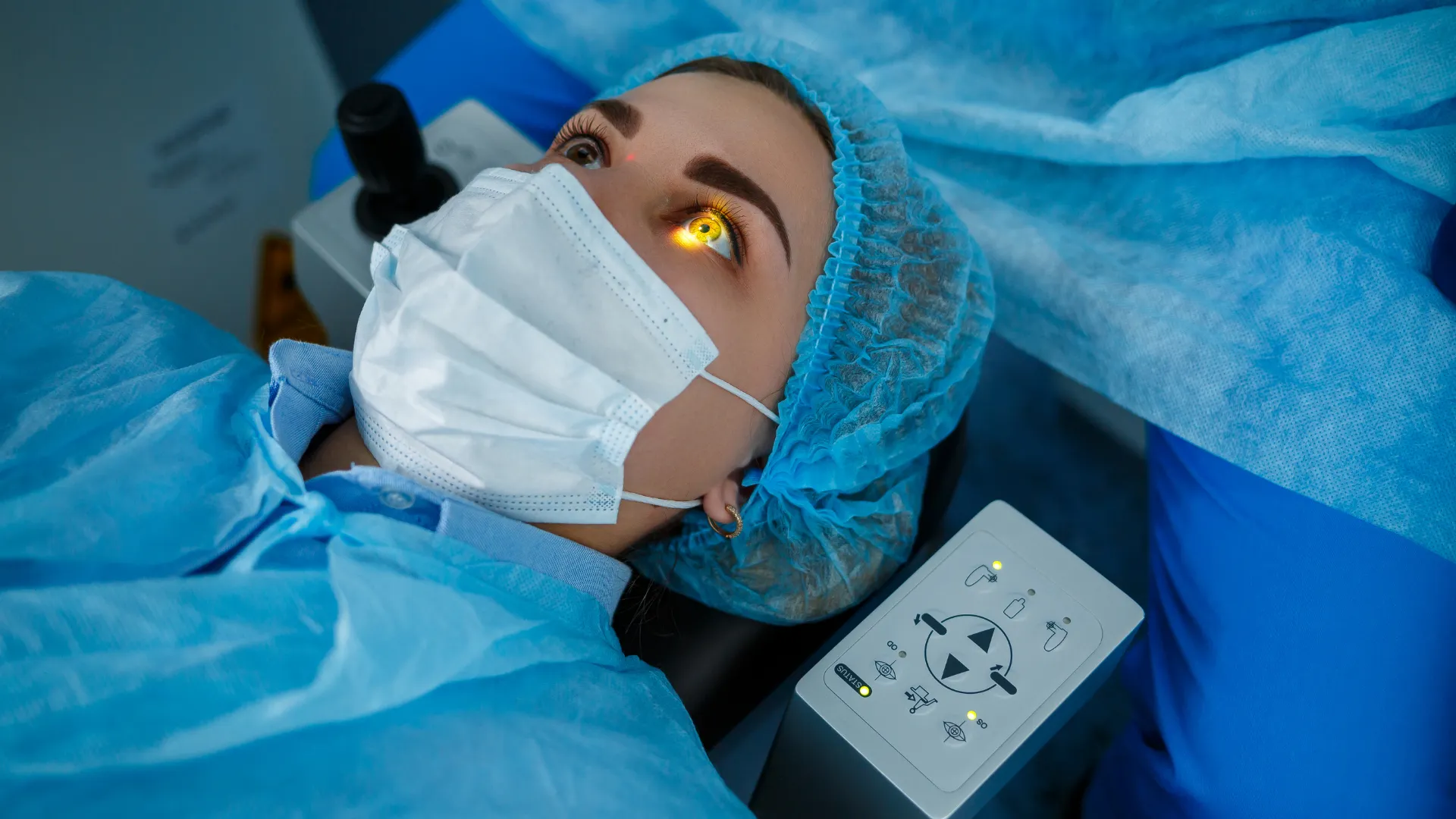 Patient undergoing a slit lamp eye evaluation before LASIK surgery.