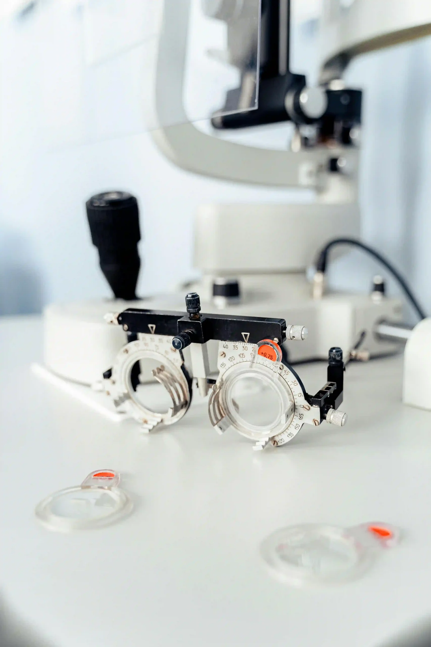 Optometry trial frame and diagnostic tools used by eye doctors.