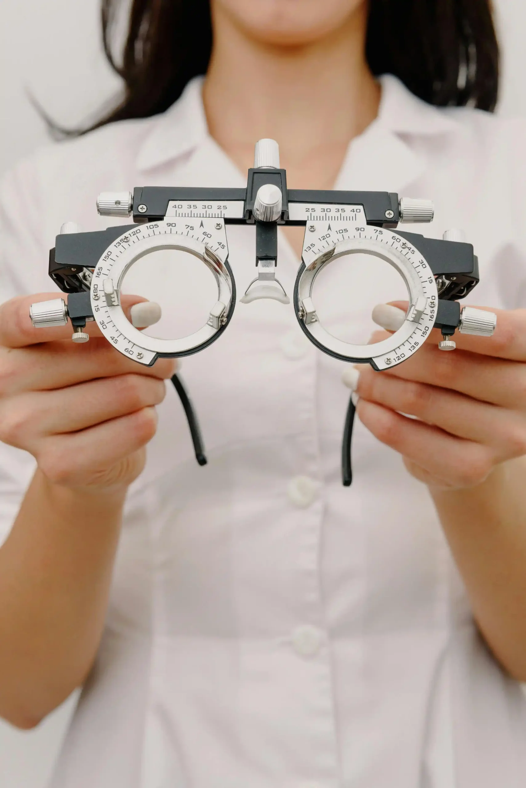 Close-up of trial frame used by eye doctors for precise vision testing.